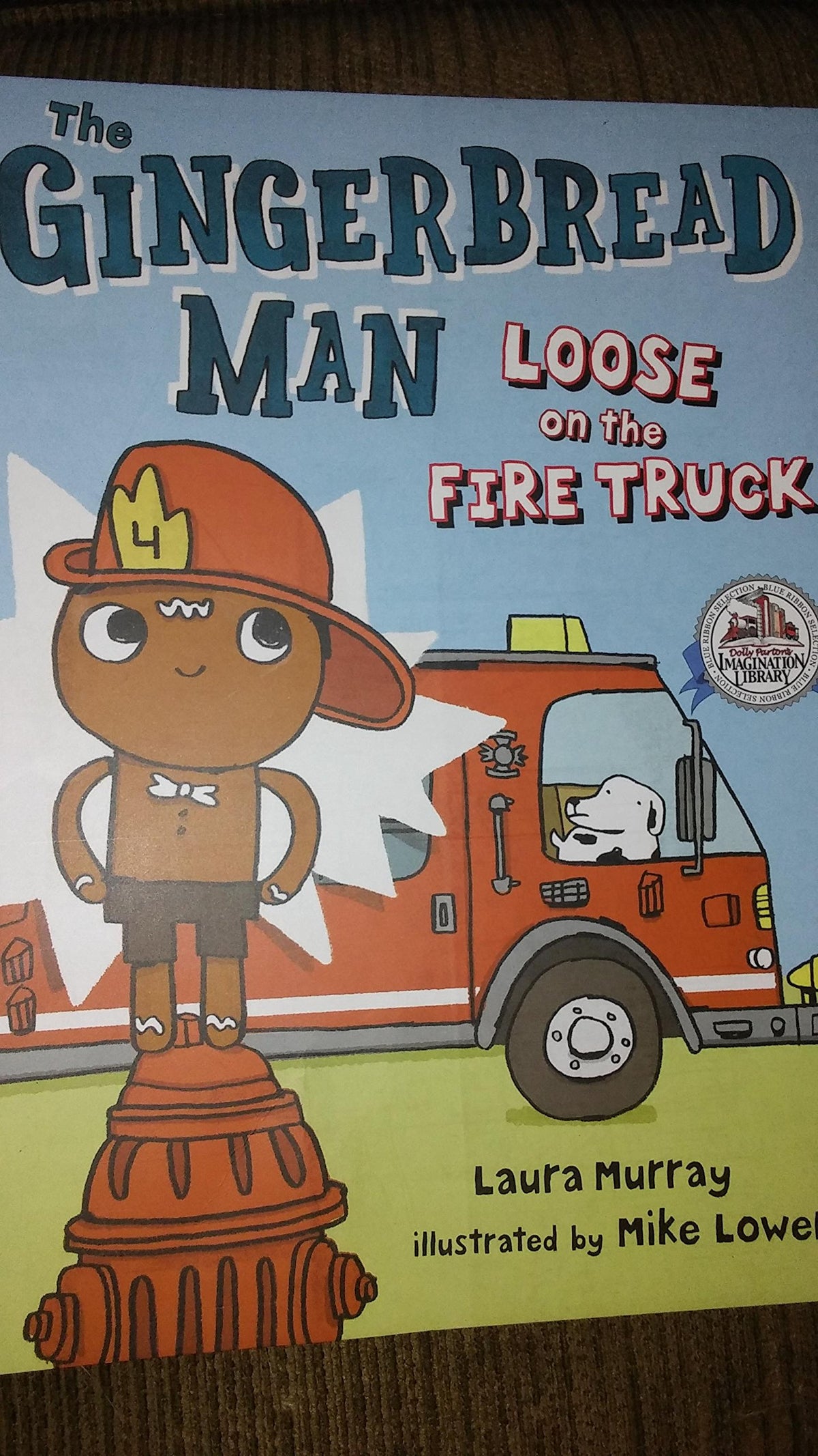 THE GINGERBREAD MAN LOOSE ON THE FIRE TRUCK. DOLLY PARTONS IMAGINATION LIBRARY