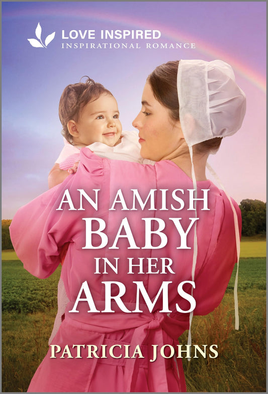 An Amish Baby in Her Arms: An Uplifting Inspirational Romance – A Heartfelt Secret Baby Story of Healing and Faith (Amish Chocolate Shop Brides, 1)